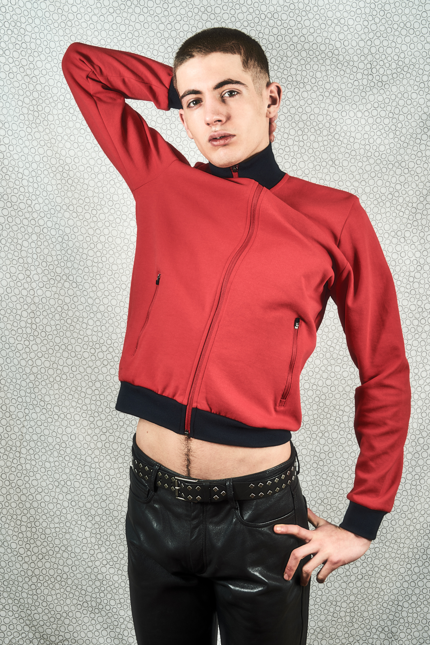 "Guy in leather pants portrait"