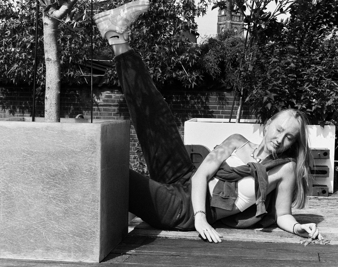 "portrait black and white of young girl Falke who loves yellow in Germany"