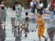 "Ab-o-Atash Park Tehran, Iran peple enjoying water fountains"