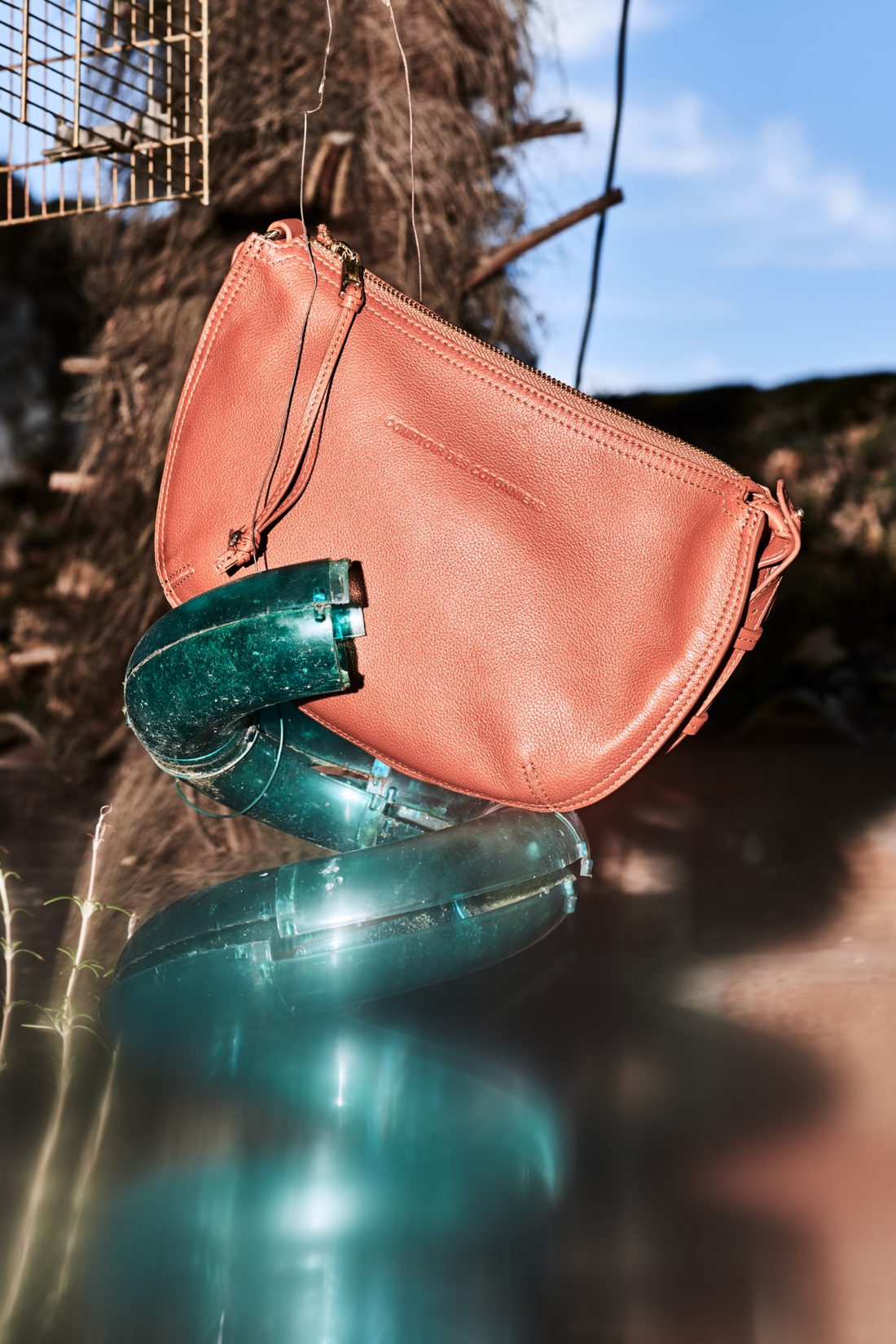 "orange leather bag"